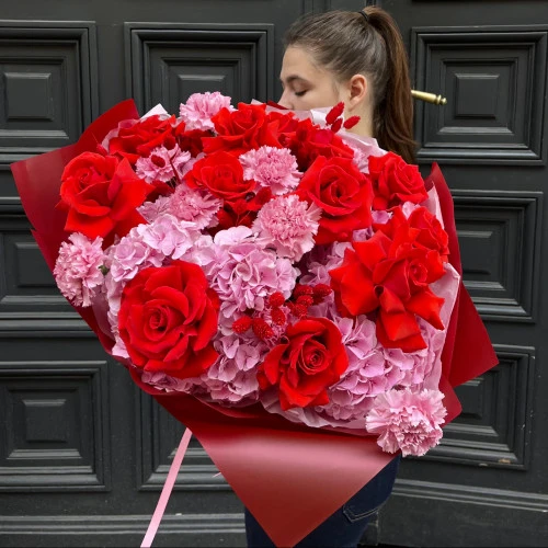 An elegant bouquet of pink hydrangeas and red roses An elegant bouquet of pink hydrangeas and red roses
